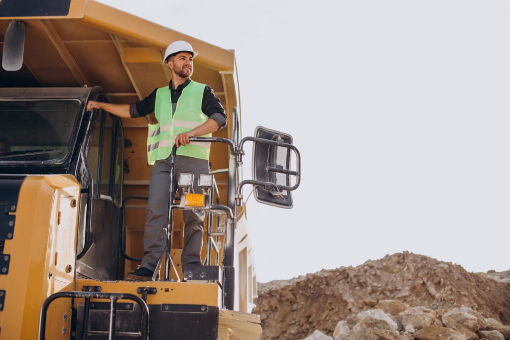male-worker-with-bulldozer-sand-quarry